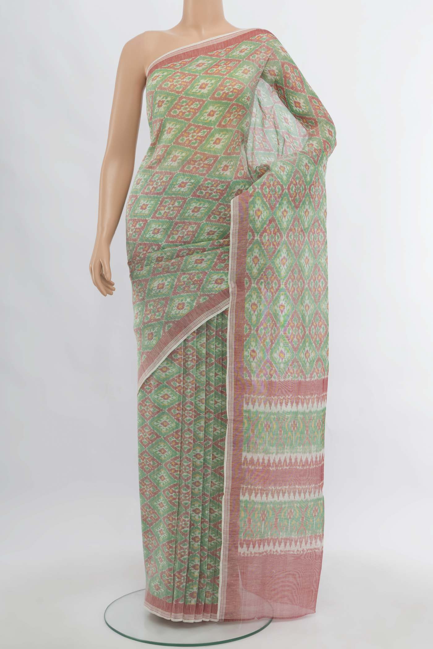 Multi Color Pochampally Saree with Ikat Print on the body and Silk Border.  displayed on a mannequin