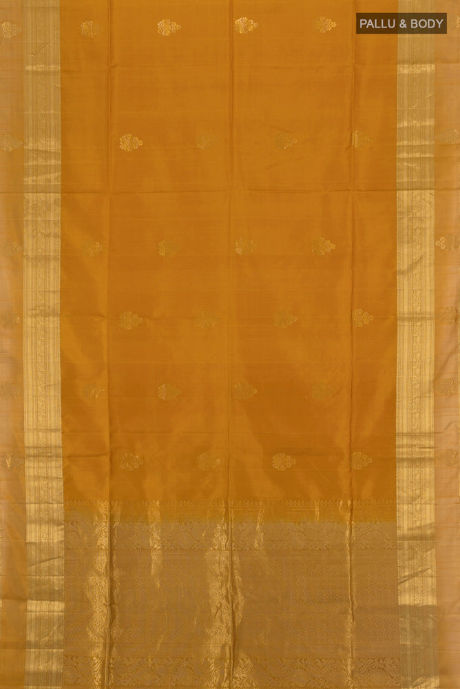 Flat view of Dark Beige Soft Silk Saree with Zari Butta on the body and Silk Border. 