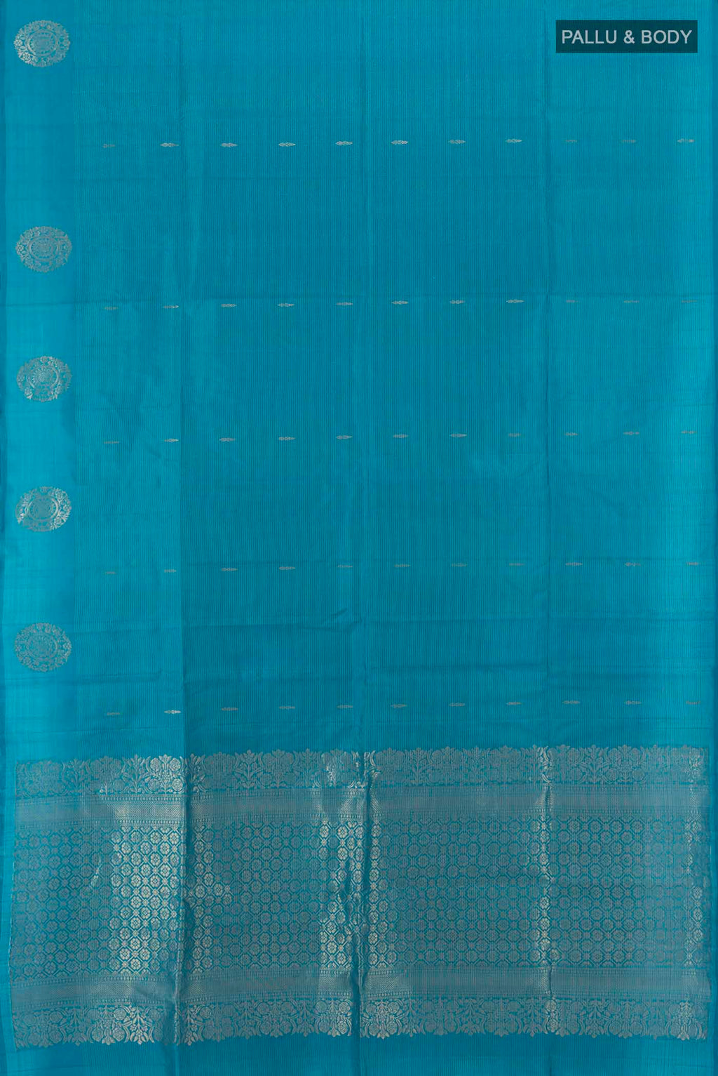 Flat view of Light Blue Soft Silk Saree with Zari Butta on the body and Silk Border. 