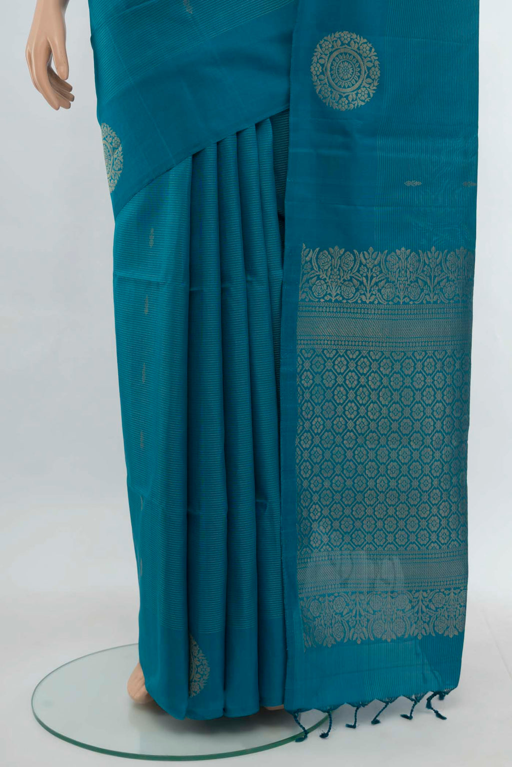 Pleats and pallu of Light Blue Soft Silk Saree with Zari Butta on the body and Silk Border. 