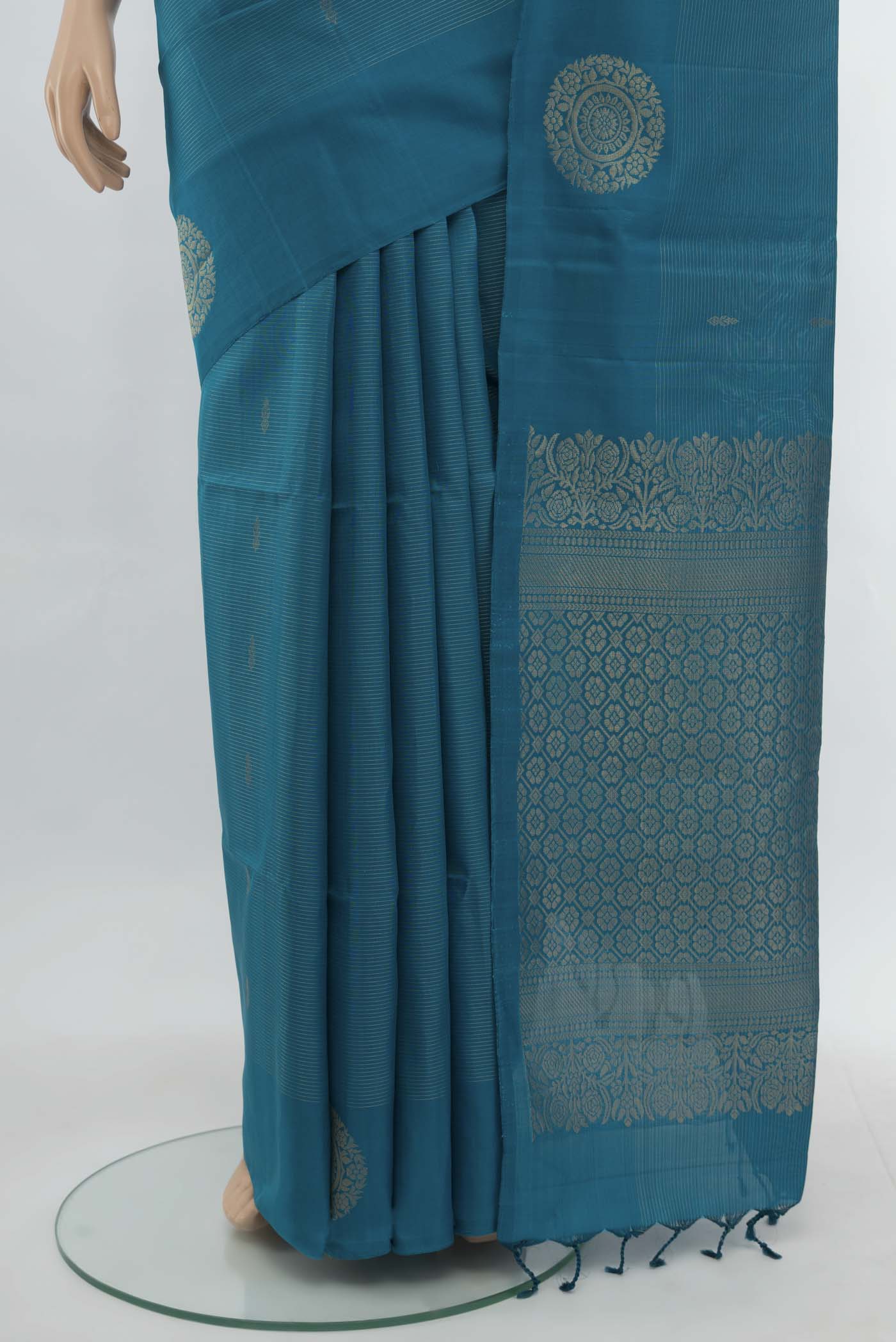 Pleats and pallu of Light Blue Soft Silk Saree with Zari Butta on the body and Silk Border. 