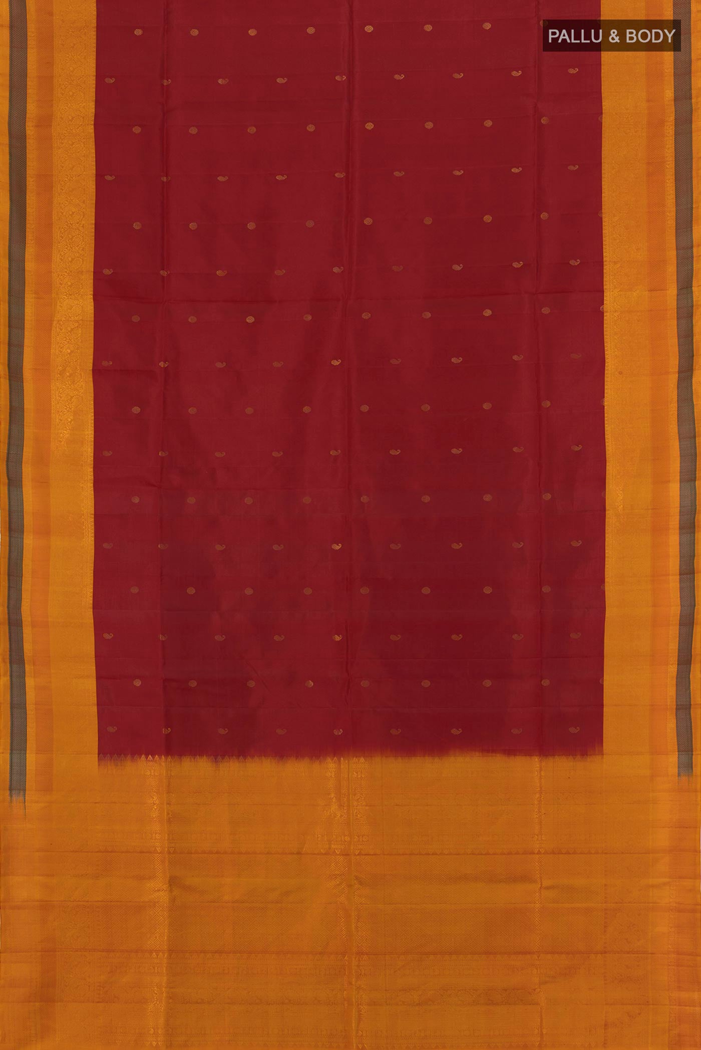 Flat view of Maroon Soft Silk Saree with Zari Butta on the body and Fancy Border. 
