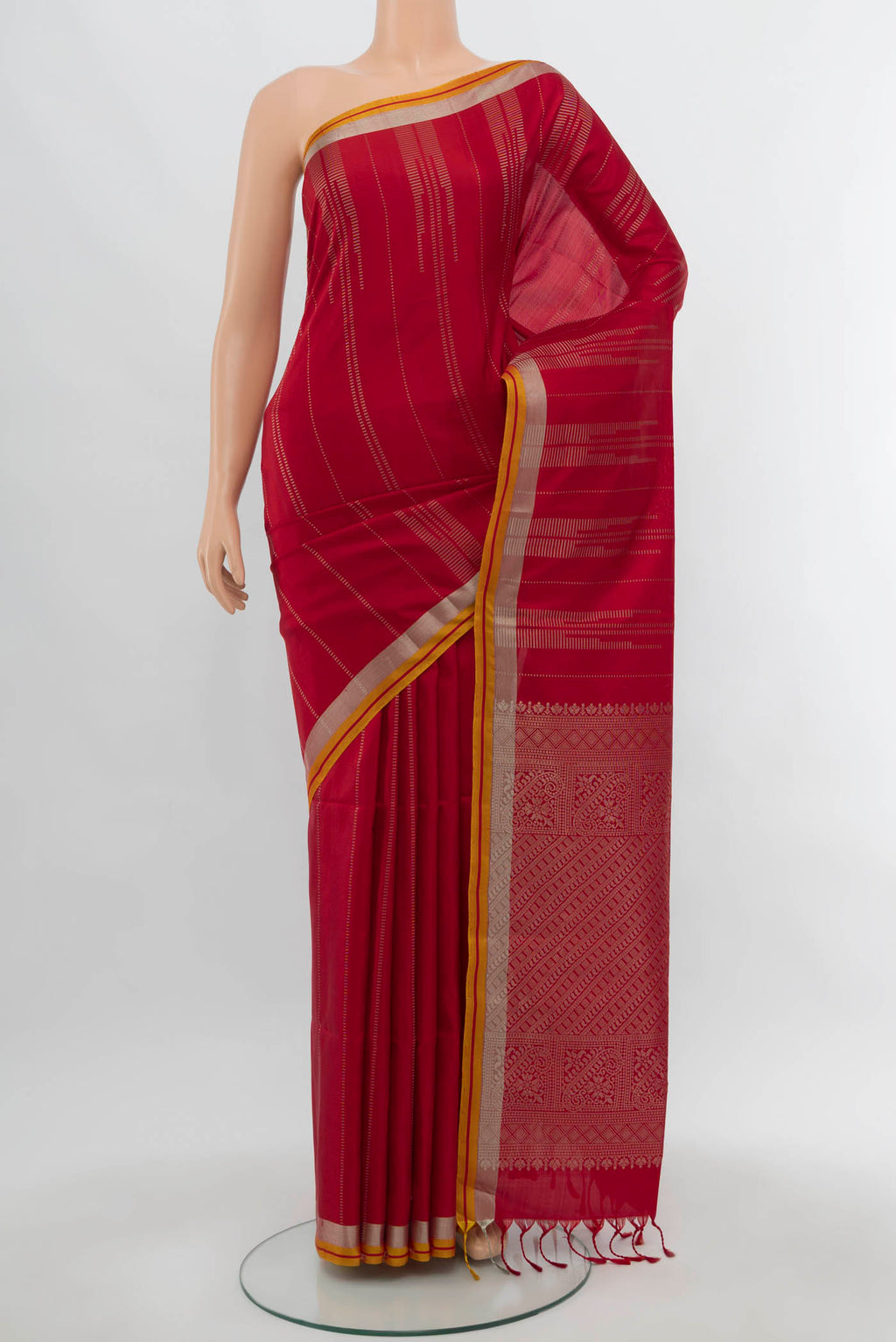 Maroon Soft Silk Saree with Zari Butta on the body and Silk Border.  displayed on a mannequin