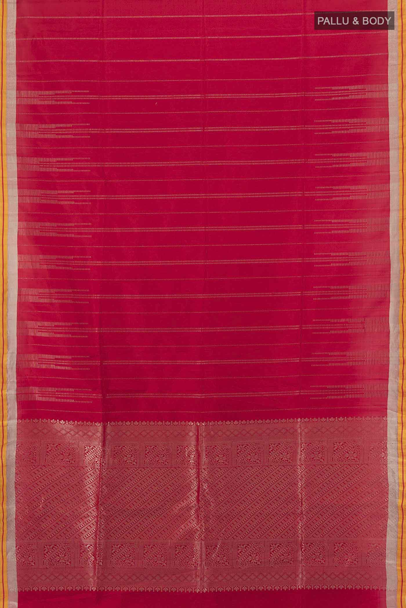 Flat view of Maroon Soft Silk Saree with Zari Butta on the body and Silk Border. 