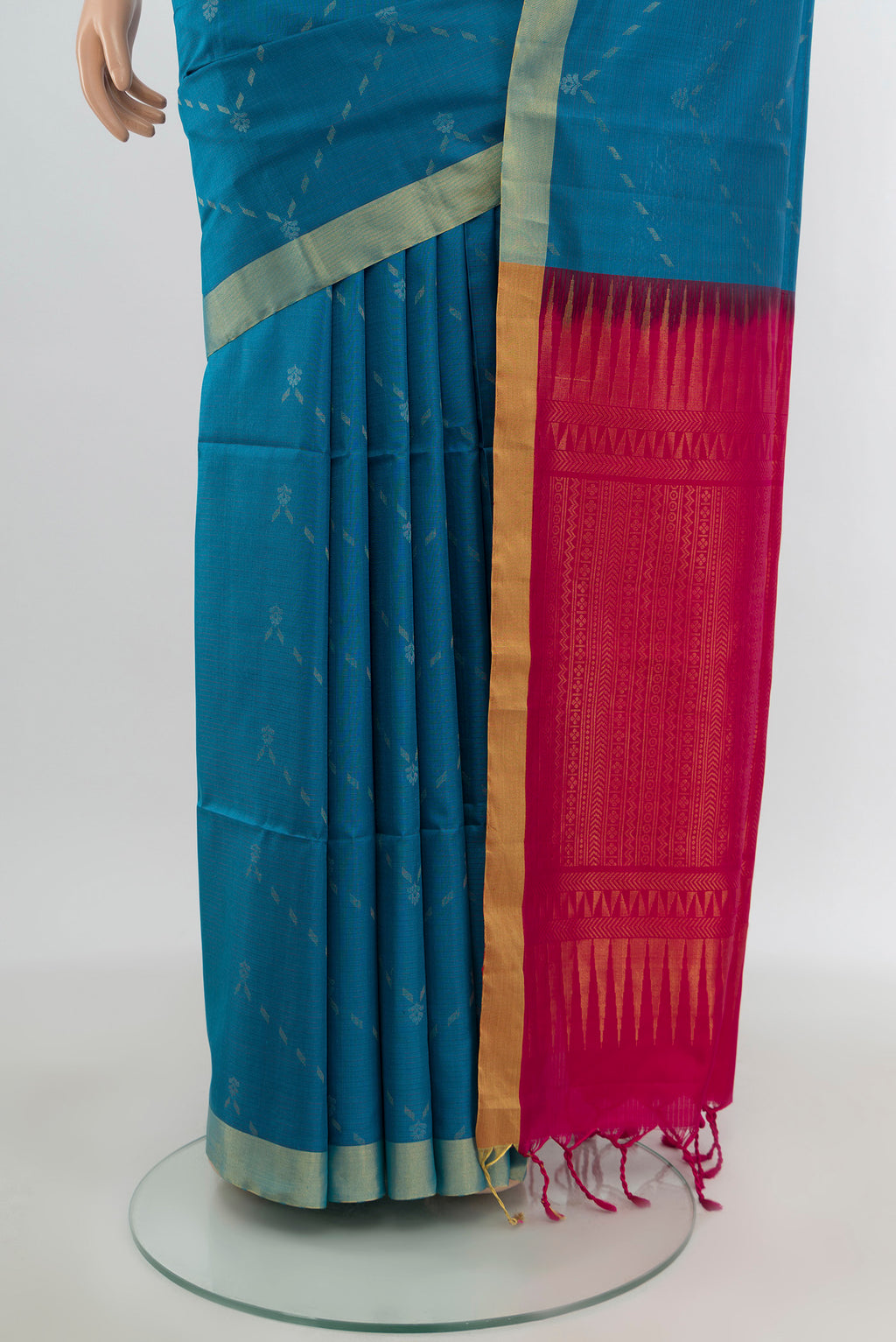 Pleats and pallu of Blue Soft Silk Saree with Zari Butta on the body and Zari Border. 