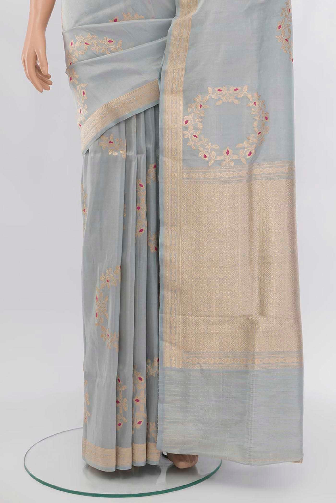 Pleats and pallu of Grey Banarasi Silk Saree with Zari Butta on the body and Silk Border. 