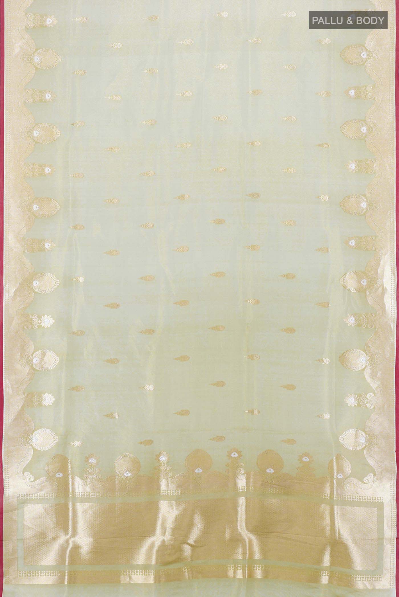 Flat view of Pista Green Banarasi Silk Saree with Zari Brocade on the body and Silk Border. 