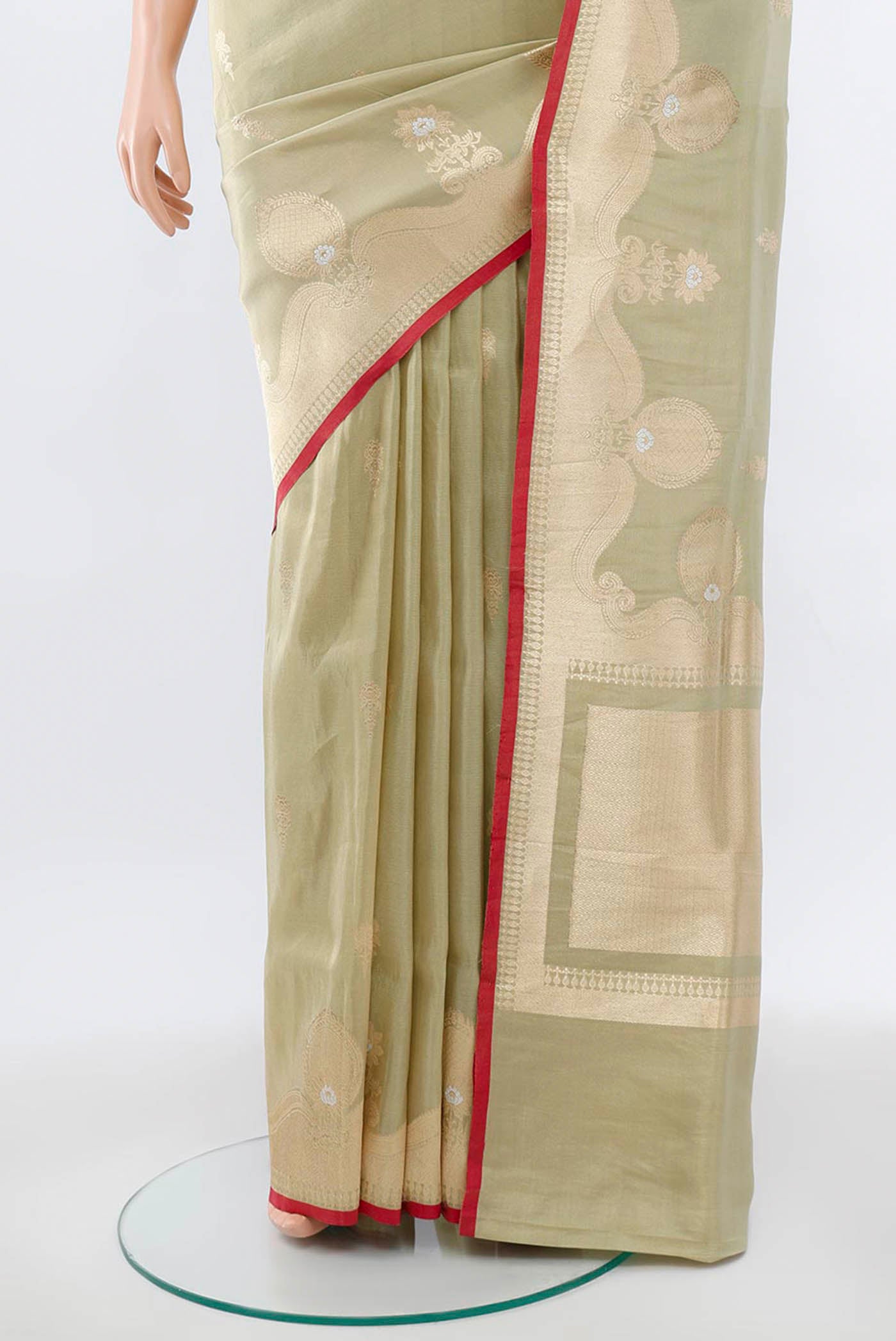 Pleats and pallu of Pista Green Banarasi Silk Saree with Zari Brocade on the body and Silk Border. 