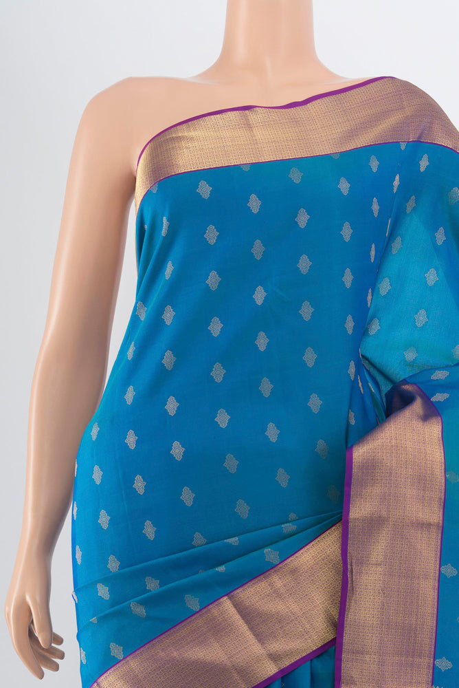 Border image of Peacock Blue Kanchipuram Silk Saree with Zari Butta on the body and Silk Border. 