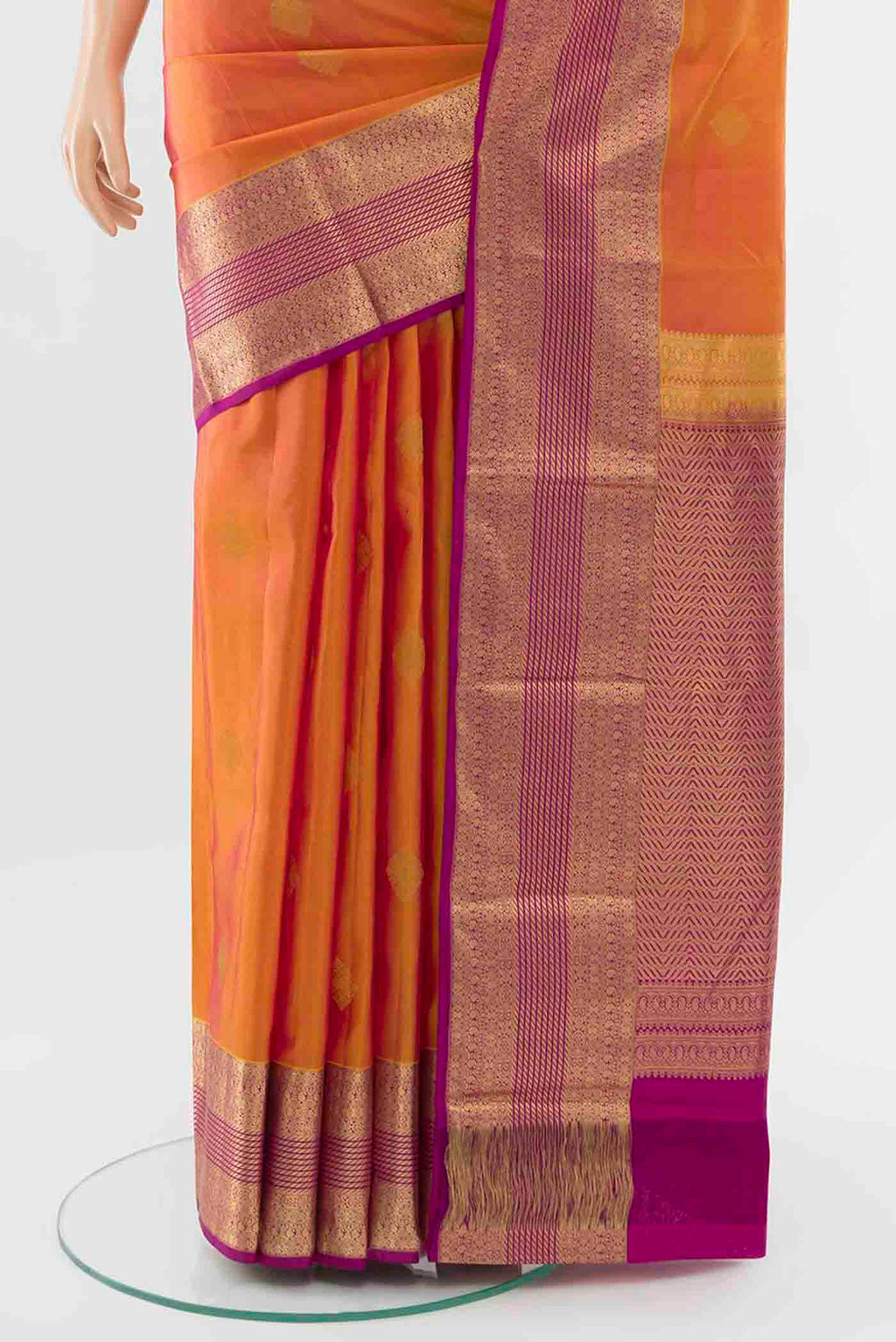 Pleats and pallu of Yellow with Pink Color Kanchipuram Silk Saree with Zari Butta on the body and Zari Border