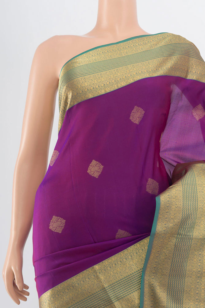 Border image of Purple Kanchipuram Silk Saree with Zari Butta on the body and Silk Border. 