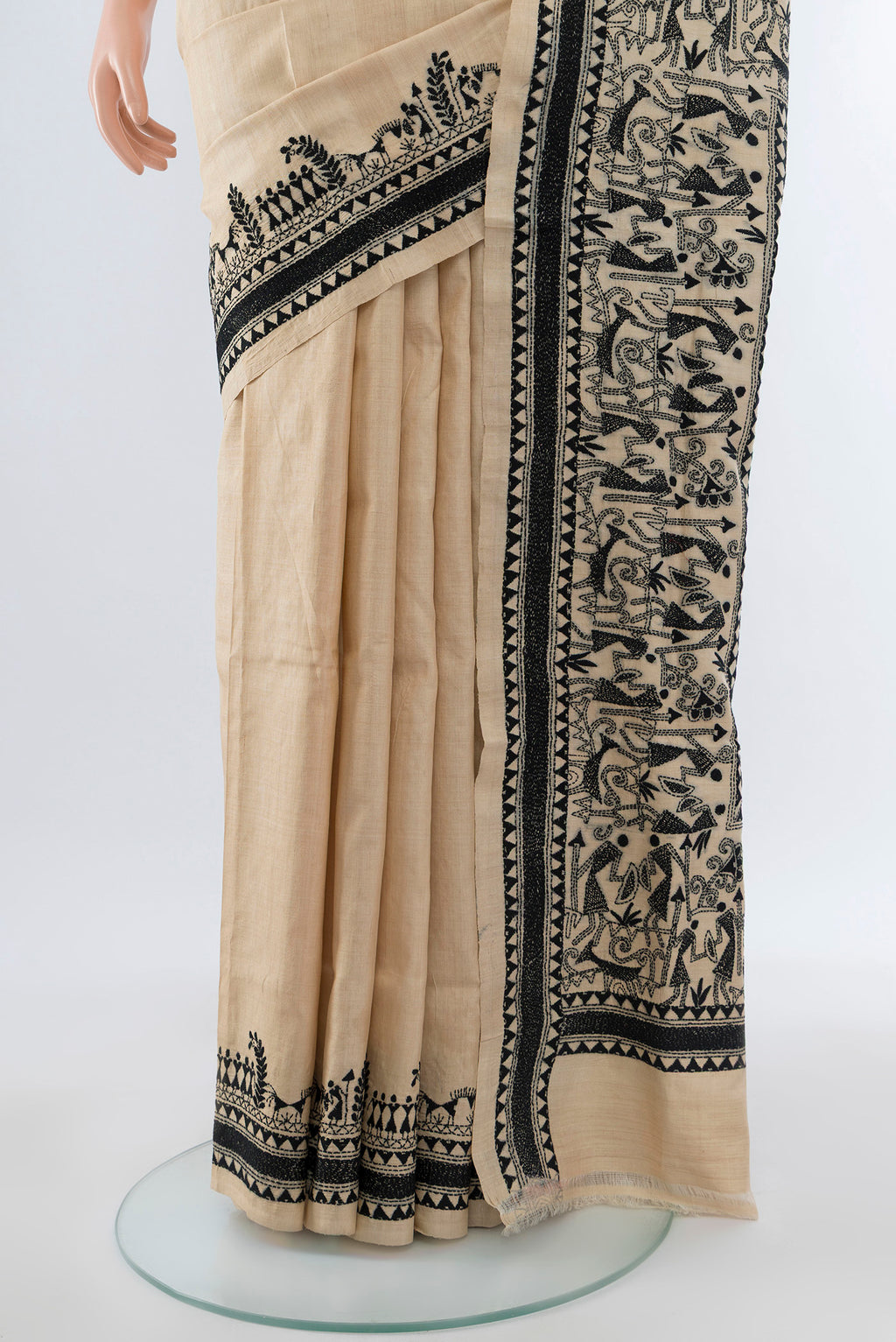 Pleats and pallu of Cream Kantha Silk Saree with Jacquard With Thread Butta on the body and Silk Border. 