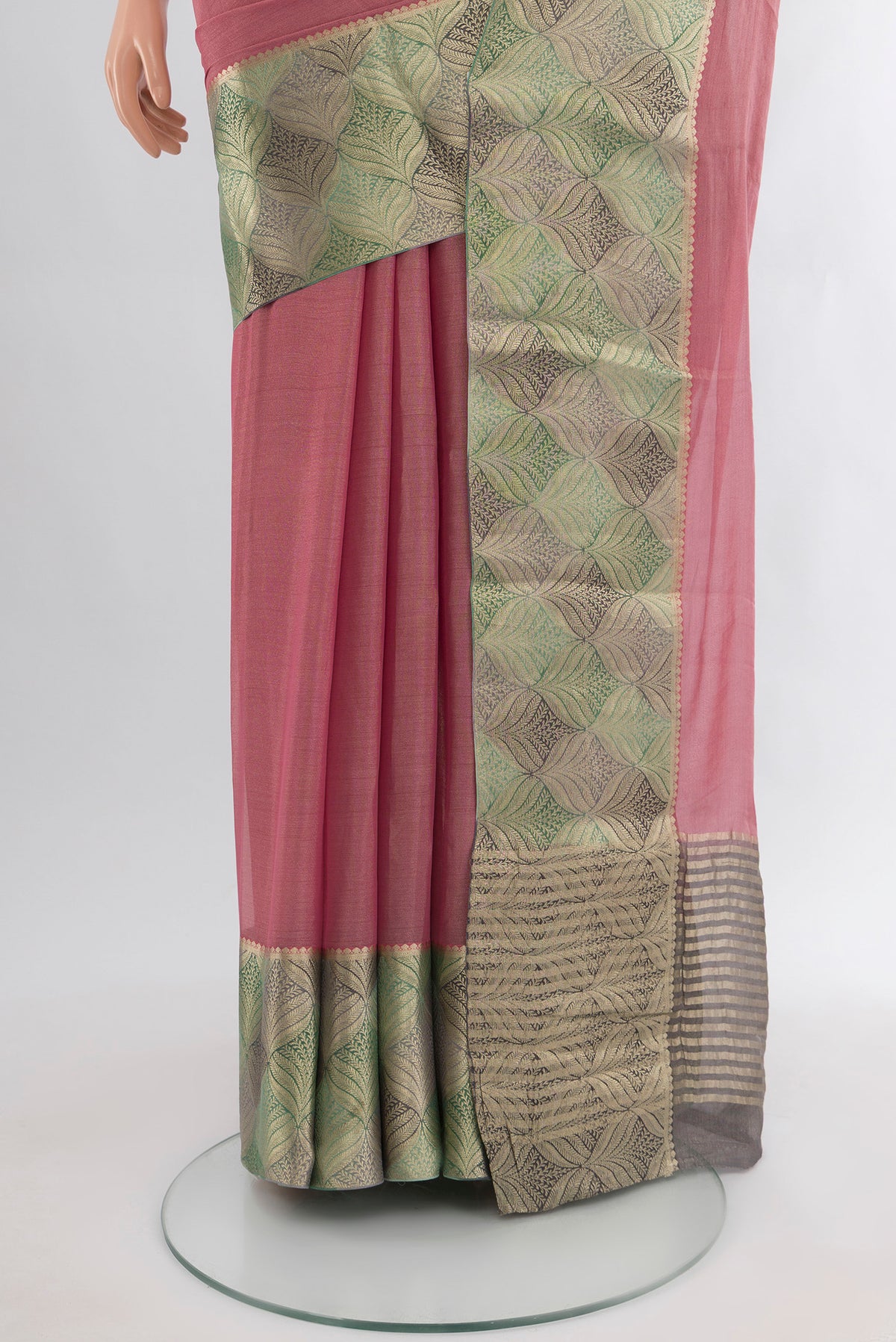 Pleats and pallu of Rose pink Mysore Georgette Saree with Plain Body and Zari Border. 