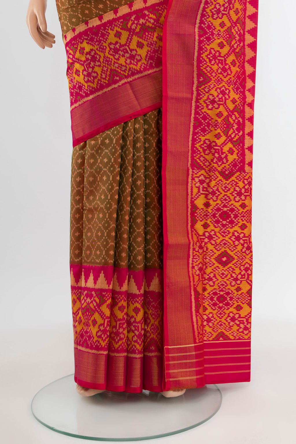 Pleats and pallu of Pure Silk Pure Zari Multi Color Rajkot Patola Saree with Ikat Print on the body and Silk Border. 