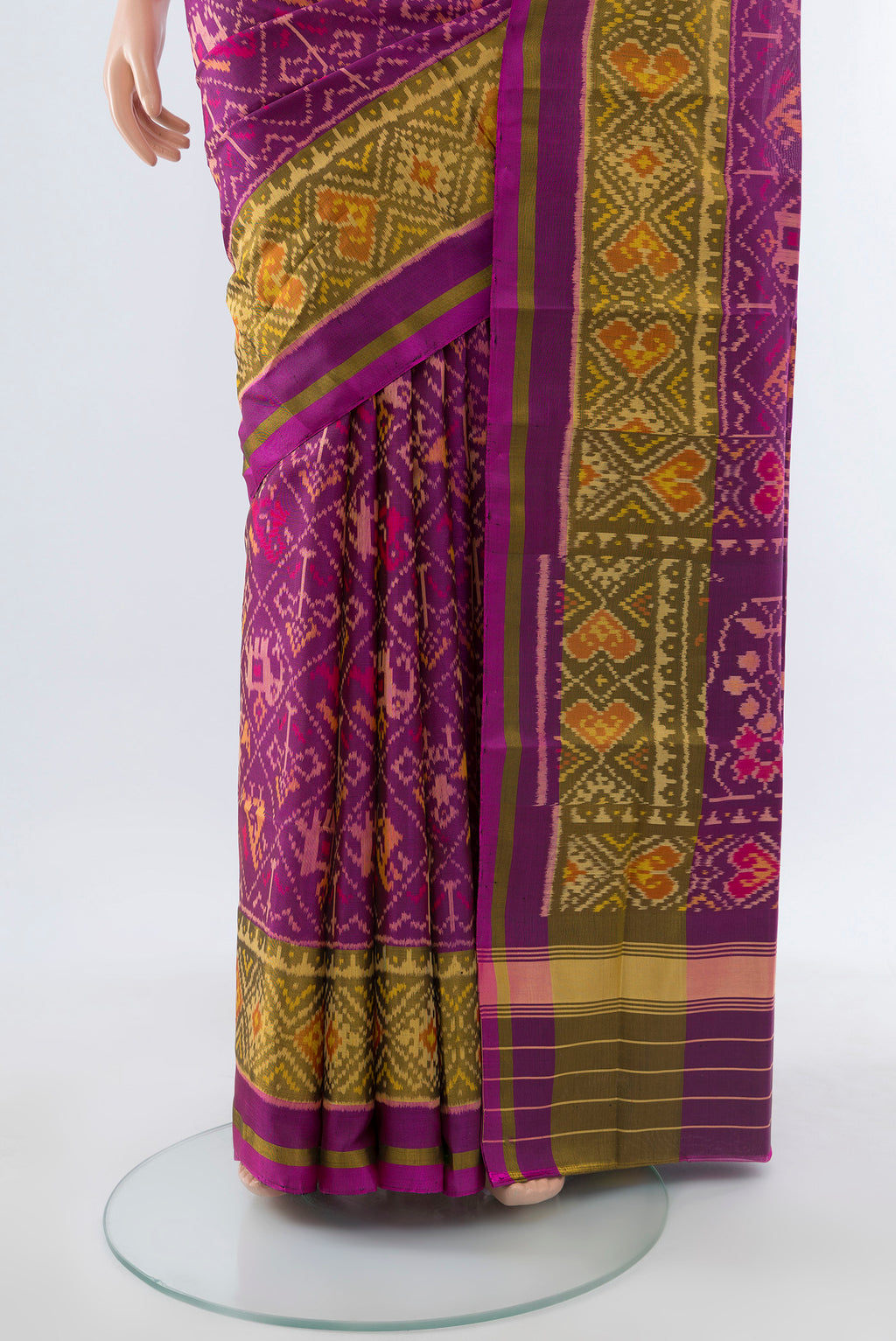 Pleats and pallu of Multi Color Rajkot Patola Silk Saree with Ikat Print on the body and Silk Border. 
