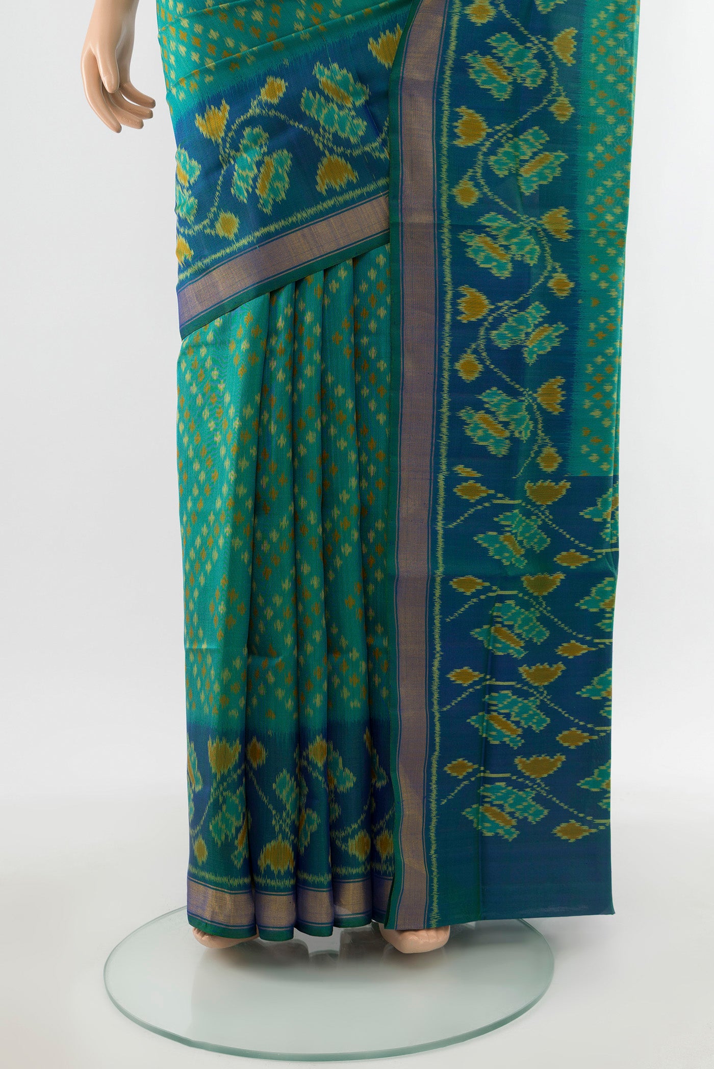 Pleats and pallu of Multi Color Rajkot Patola Silk Saree with Ikat Print on the body and Silk Border. 
