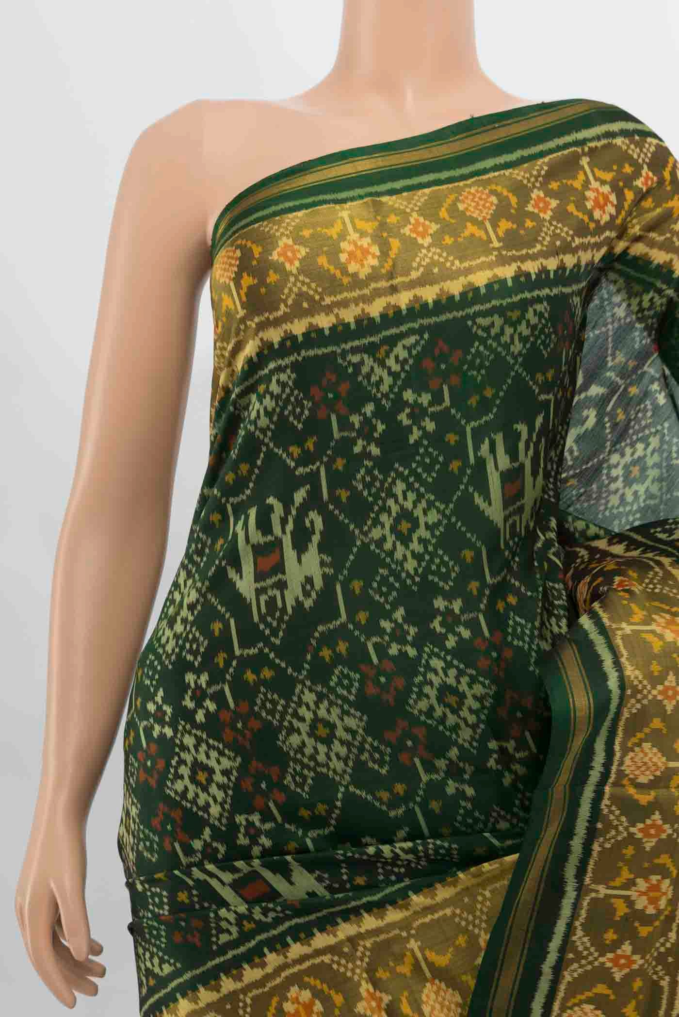 Border image of Bottle Green Rajkot Patola Silk Saree with Zari Butta on the body and Silk Border. 