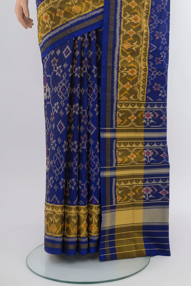 Pleats and pallu of Dark Blue Rajkot Patola Silk Saree with Ikat Print on the body and Silk Border. 