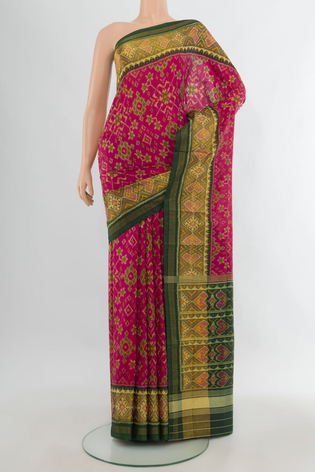 Pure Silk Pink Rajkot Patola Saree with Pure Ikat on the body and Ikat Border.  displayed on a mannequin