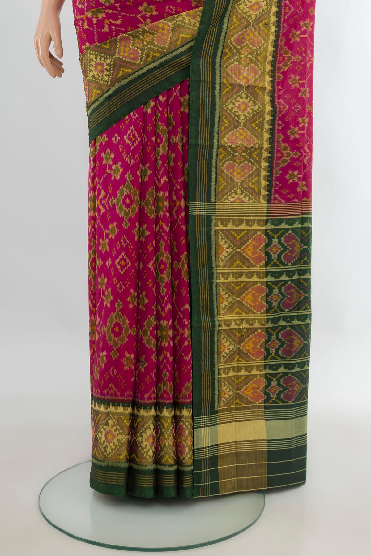Pleats and pallu of Pure Silk Pink Rajkot Patola Saree with Pure Ikat on the body and Ikat Border. 