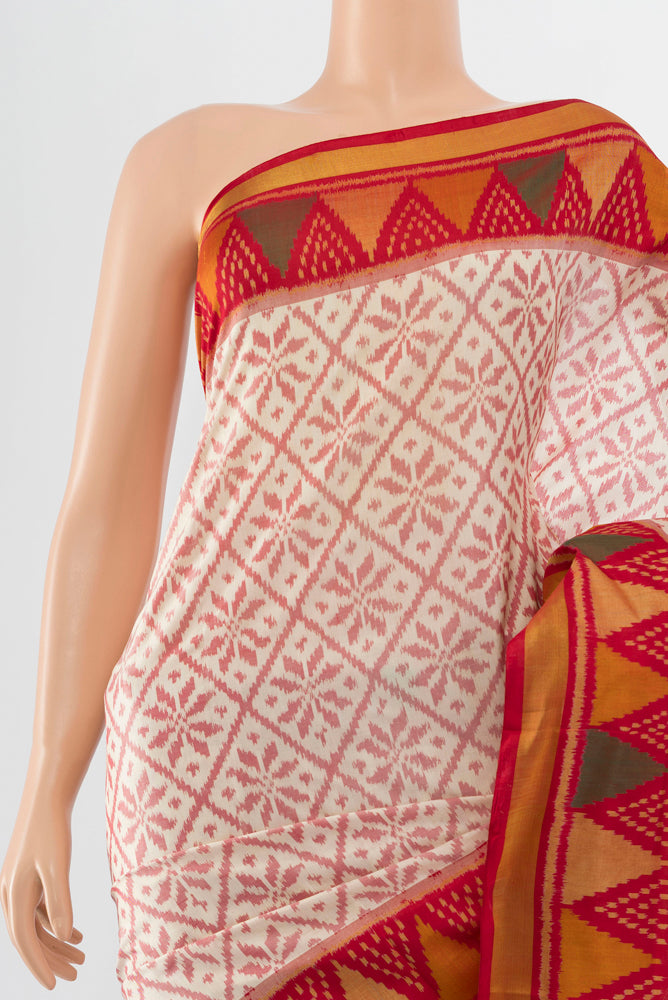 Border image of Off White Rajkot Patola Silk Saree with Batik Print on the body and Silk Border. 