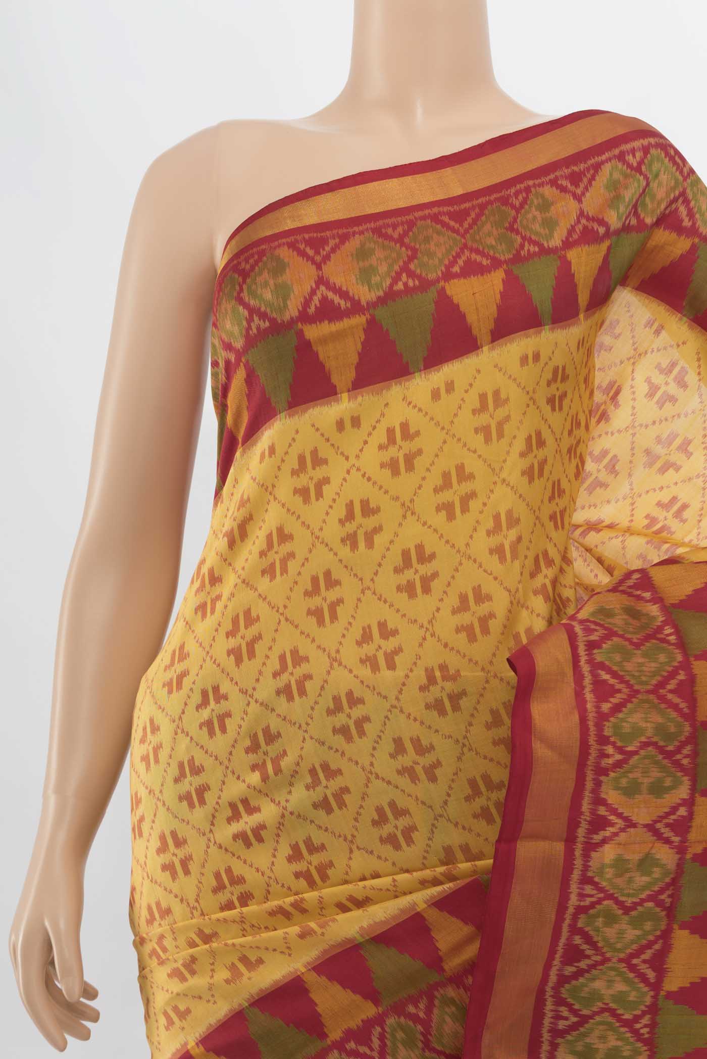 Border image of Beige Rajkot Patola Silk Saree with Ikat Print on the body and Silk Border. 