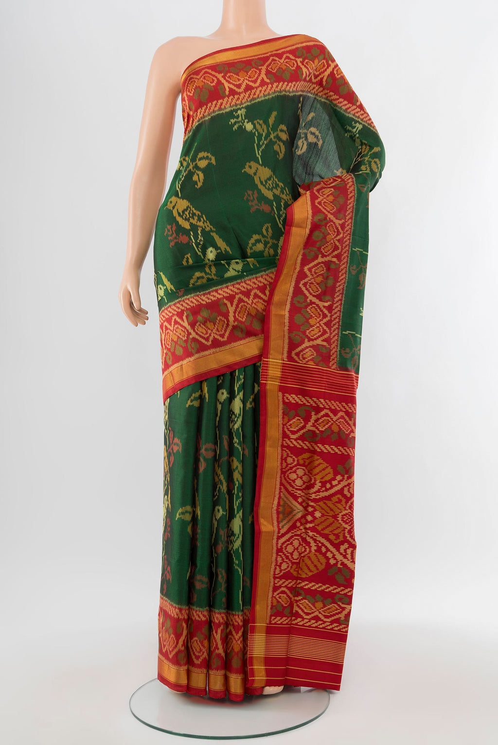 Multi Color Pochampally Saree with Ikat Print on the body and Silk Border.  displayed on a mannequin