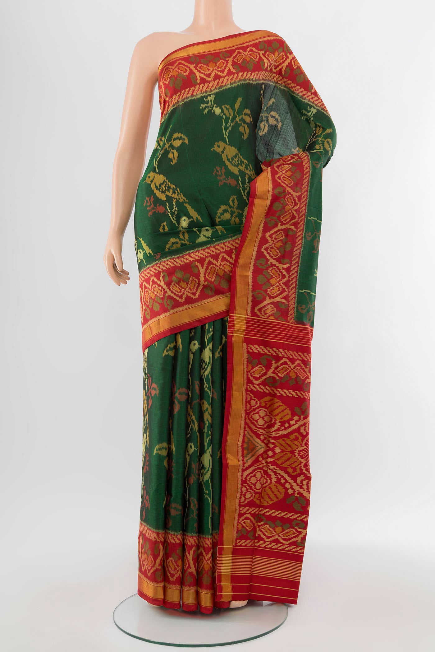 Multi Color Pochampally Saree with Ikat Print on the body and Silk Border.  displayed on a mannequin