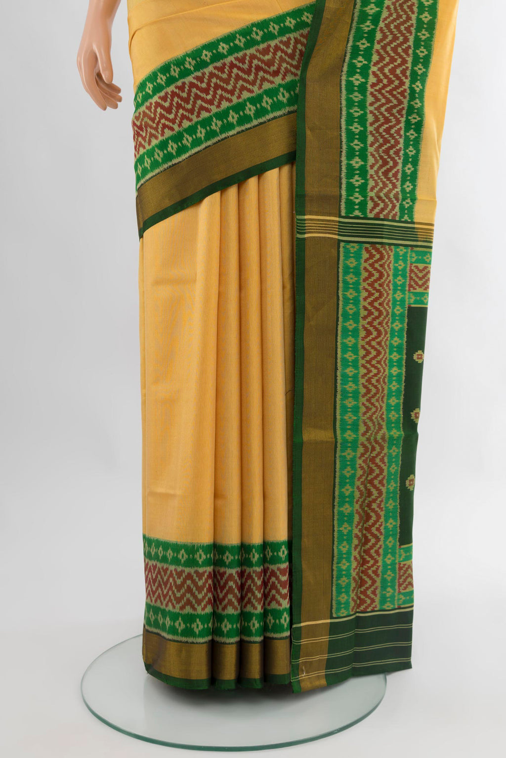 Pleats and pallu of Yellow Rajkot Patola Silk Saree with Plain Body and Ikat Border. 