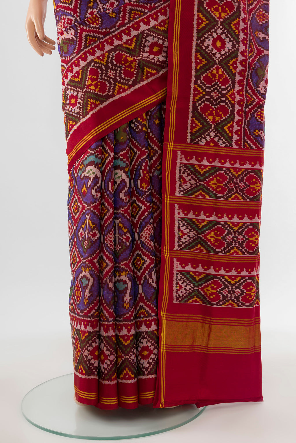 Pleats and pallu of Multi Color Rajkot Patola Silk Saree with Ikat Print on the body and Silk Border. 