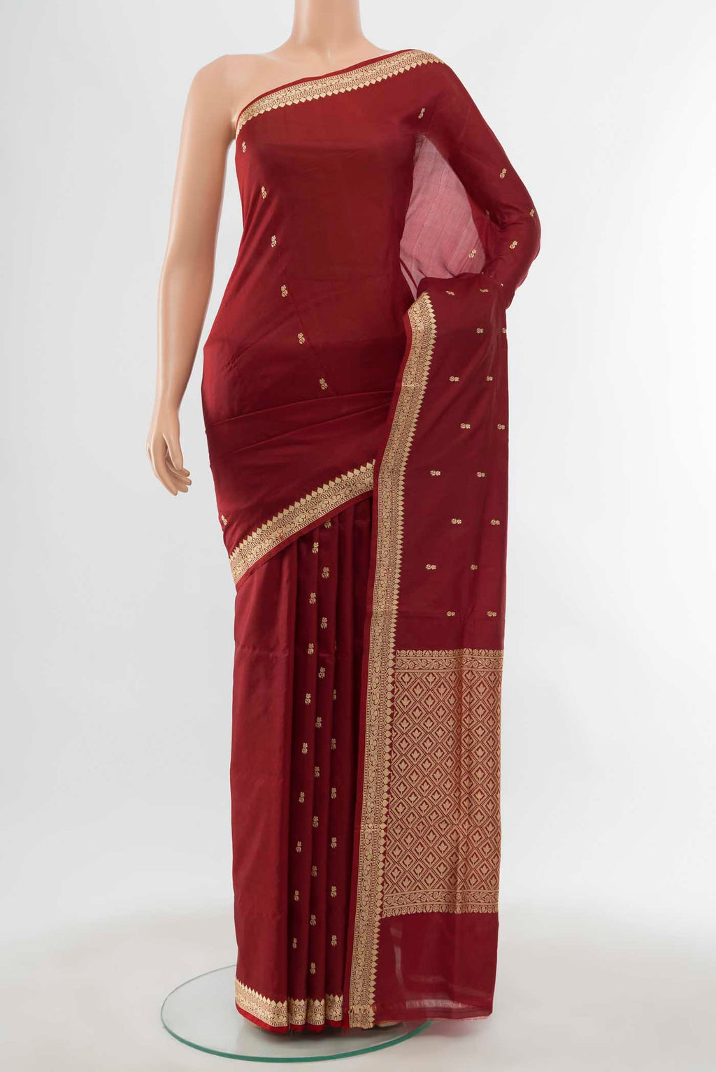 Maroon Banarasi Katan Silk Saree with Thread Butta on the body and Thread Border displayed on a mannequin