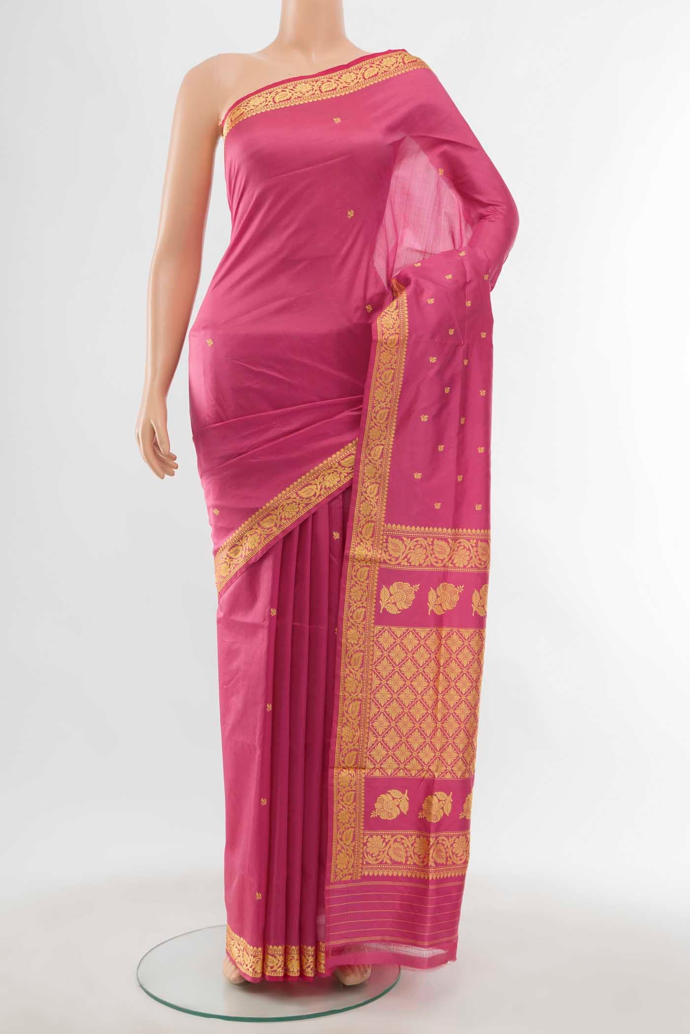 Rose pink Banarasi Katan Silk Saree with Thread Butta on the body and Thread Border displayed on a mannequin
