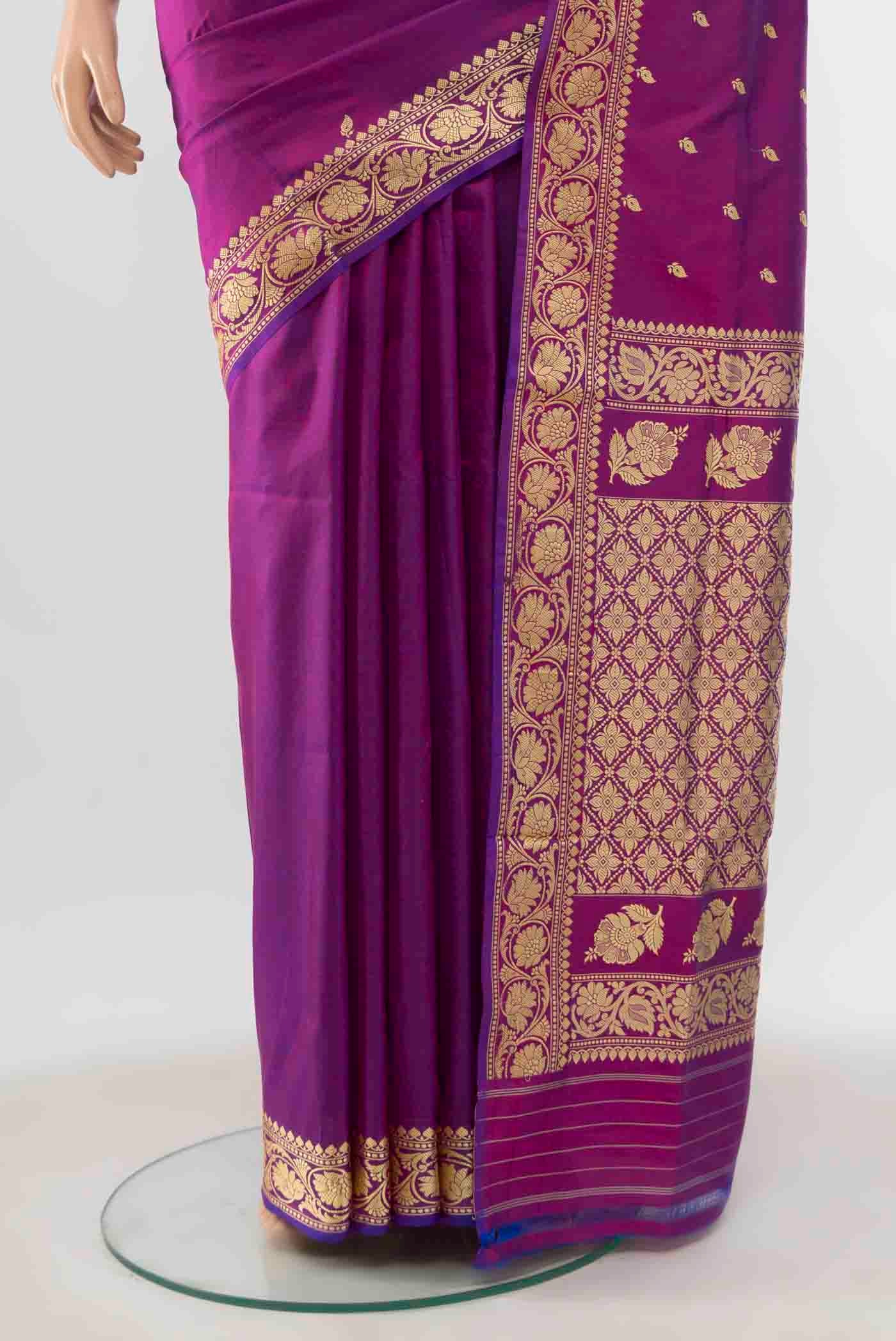 Pleats and pallu of Magenta Banarasi Katan Silk Saree with Zari Butta on the body and Silk Border