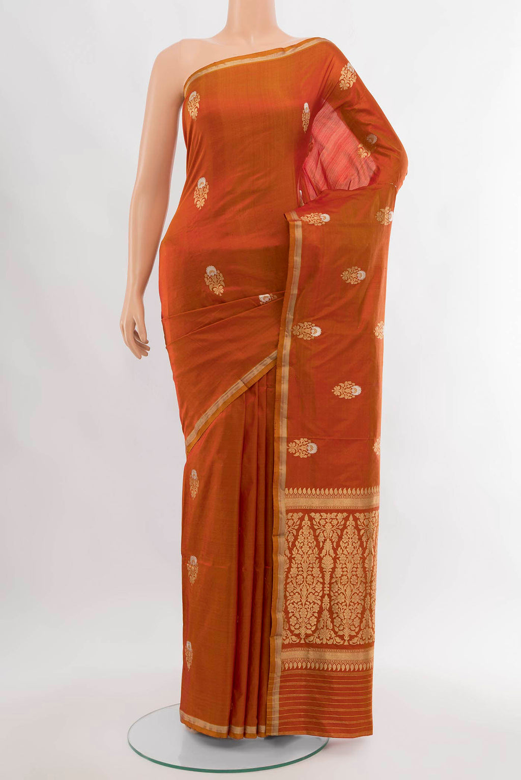 Violet Banarasi Katan Silk Saree with Zari Butta on the body and Silk Border.  displayed on a mannequin