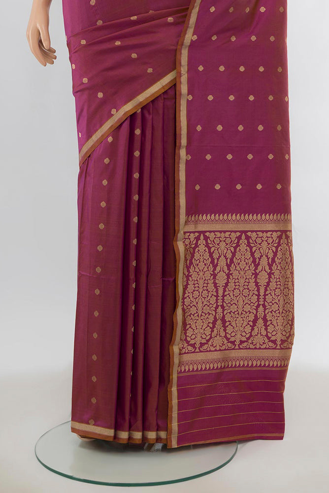 Pleats and pallu of Light Magenta Banarasi Katan Silk Saree with Zari Butta on the body and Silk Border. 