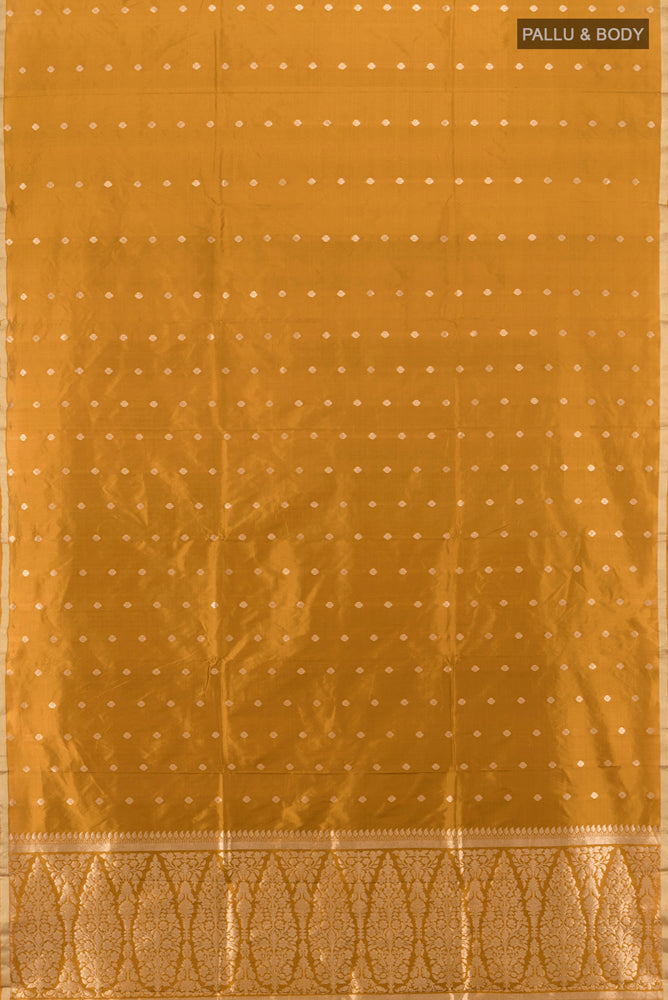 Flat view of Pure Silk Pure Zari Mehandi Green Banarasi Katan Saree with Zari Butta on the body and Silk Border. 