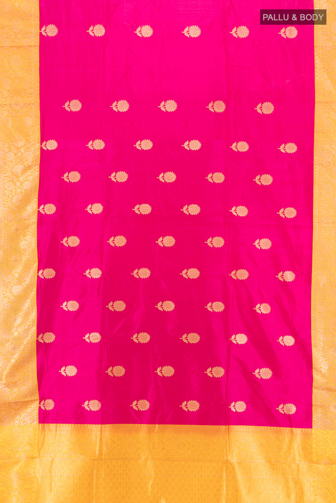 Flat view of Pure Silk Pure Zari Magenta Banarasi Katan Saree with Zari Butta on the body and Silk Border. 