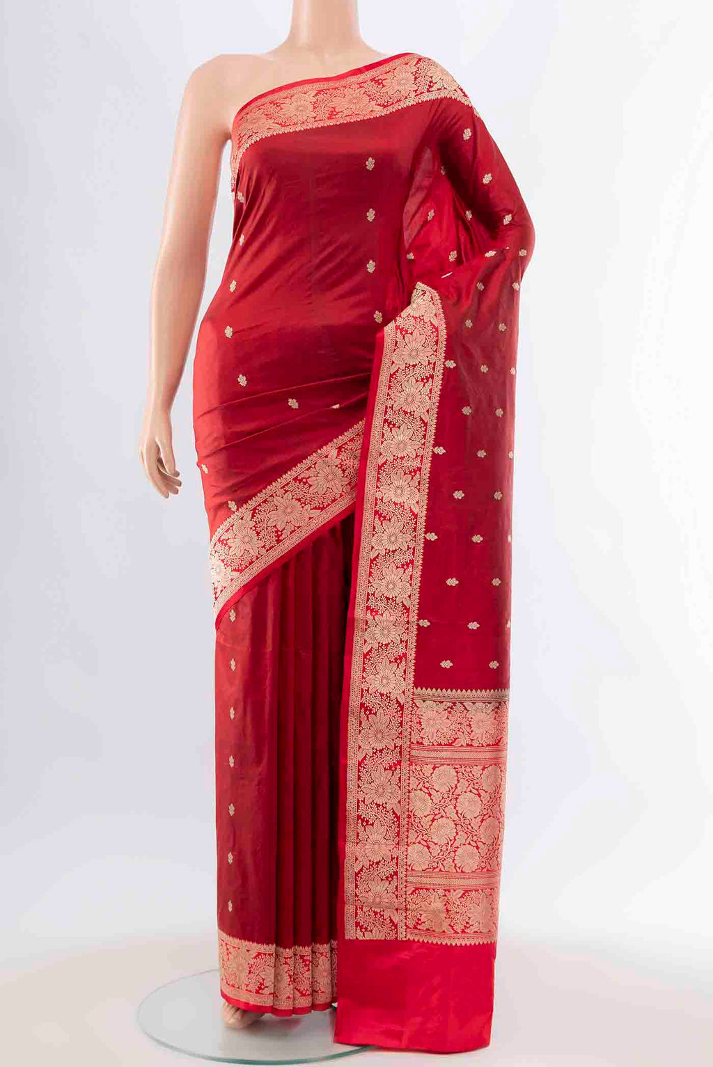 Maroon Banarasi Katan Silk Saree with Zari Butta on the body and Zari Border displayed on a mannequin