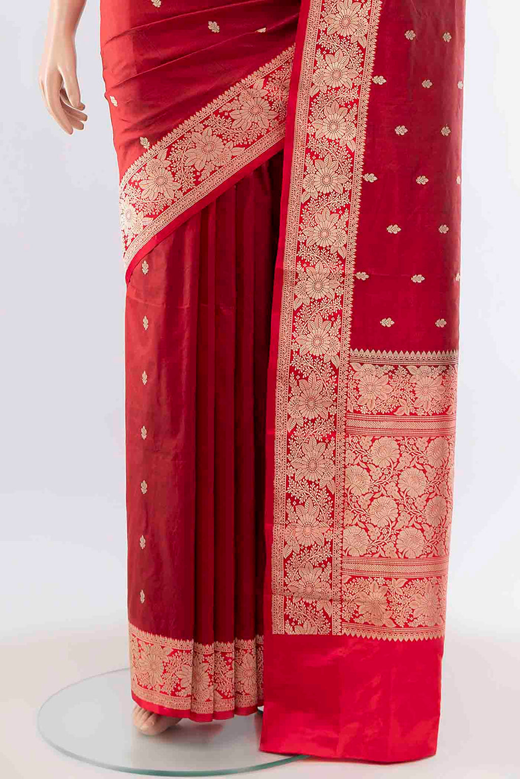 Pleats and pallu of Maroon Banarasi Katan Silk Saree with Zari Butta on the body and Zari Border