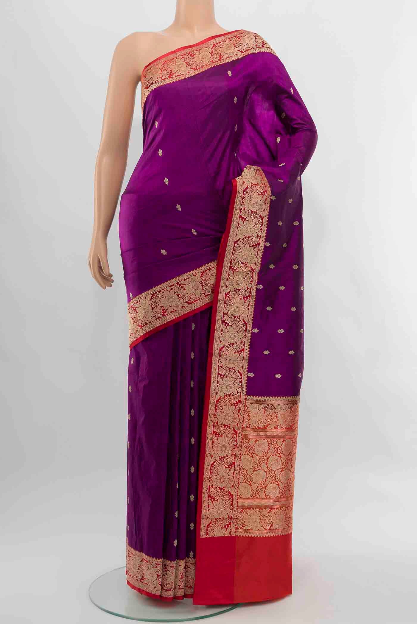 Purple Banarasi Katan Silk Saree with Zari Butta on the body and Silk Border displayed on a mannequin