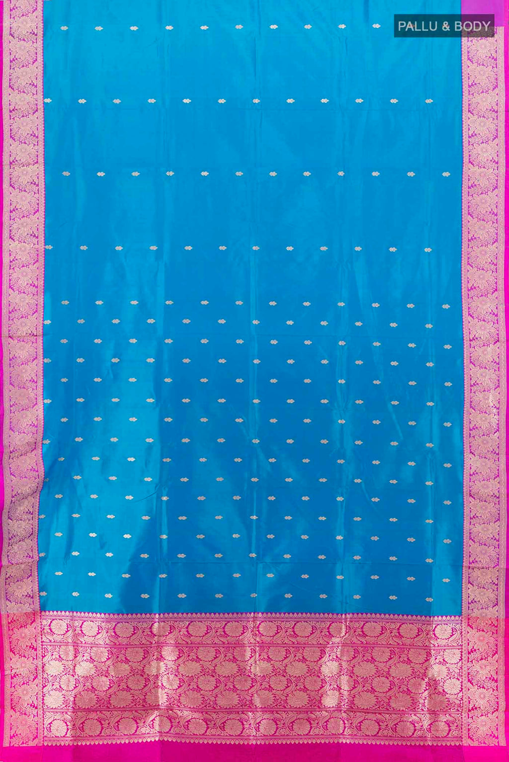 Flat view of Light Blue Banarasi Katan Silk Saree with Zari Butta on the body and Silk Border. 