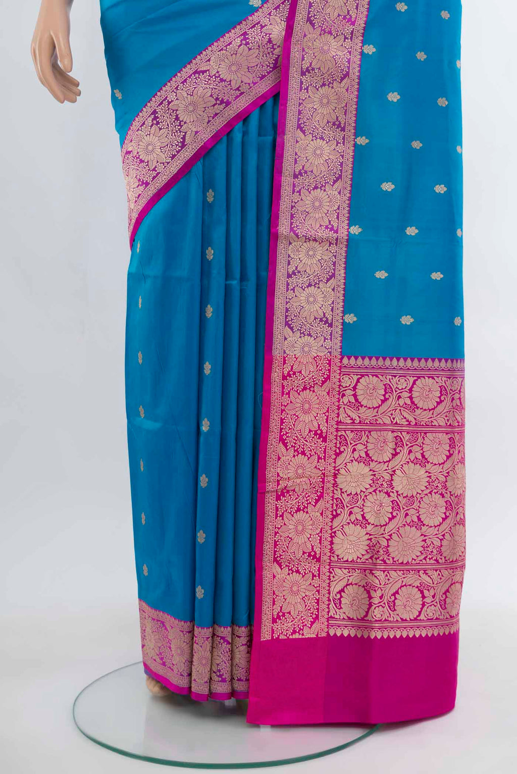 Pleats and pallu of Light Blue Banarasi Katan Silk Saree with Zari Butta on the body and Silk Border. 