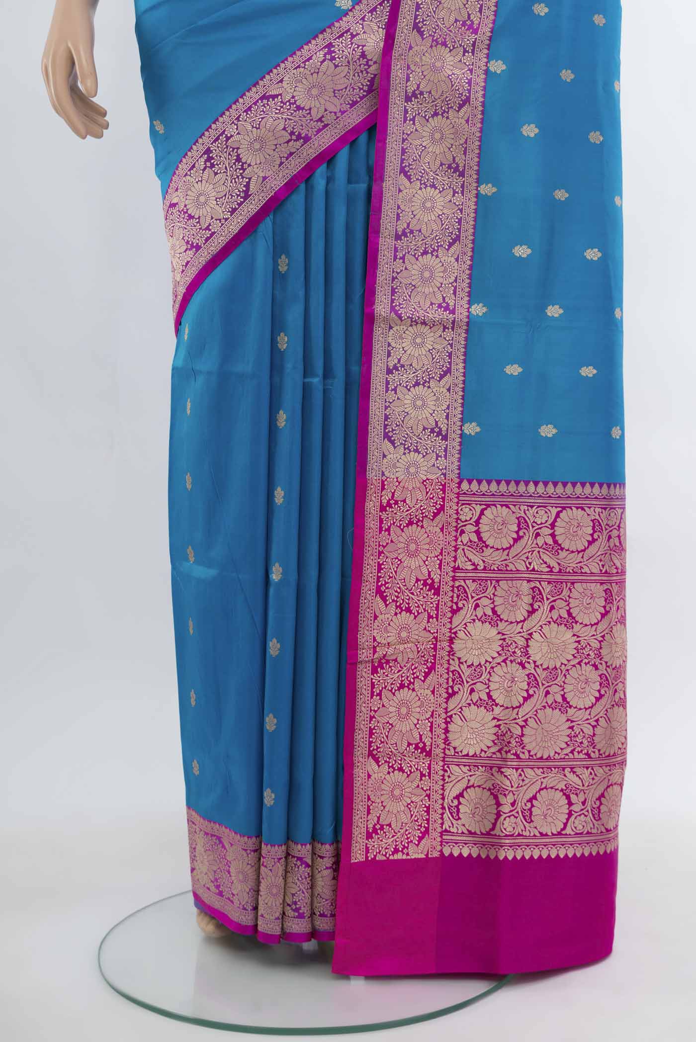 Pleats and pallu of Light Blue Banarasi Katan Silk Saree with Zari Butta on the body and Silk Border. 
