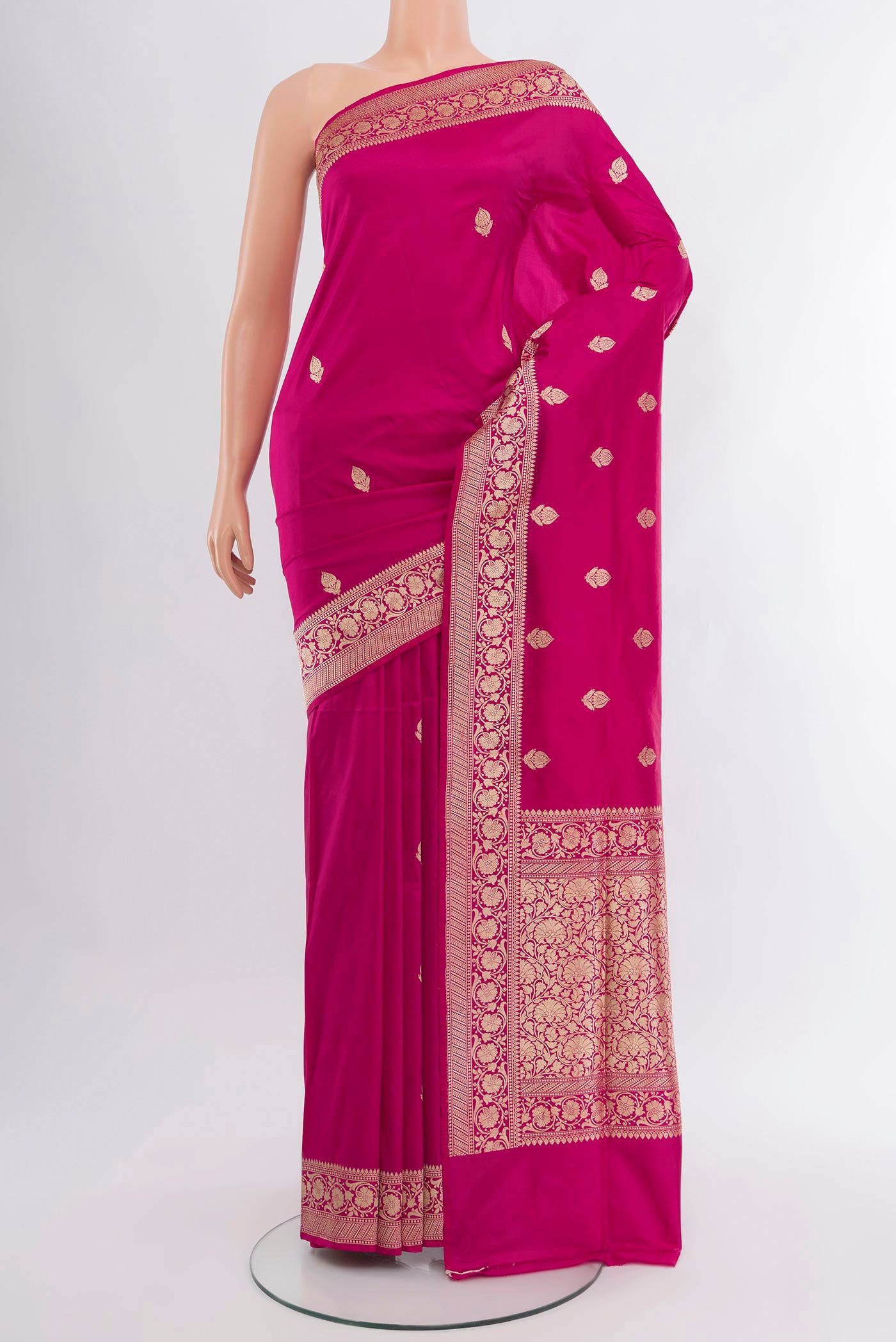 Dark Pink Banarasi Katan Silk Saree with Zari Butta on the body and Zari Border.  displayed on a mannequin