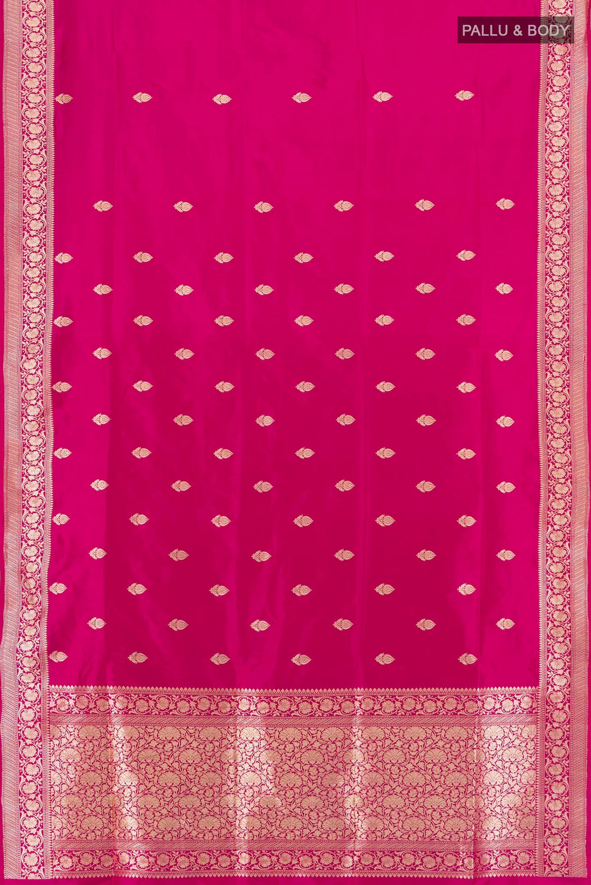 Flat view of Dark Pink Banarasi Katan Silk Saree with Zari Butta on the body and Zari Border. 