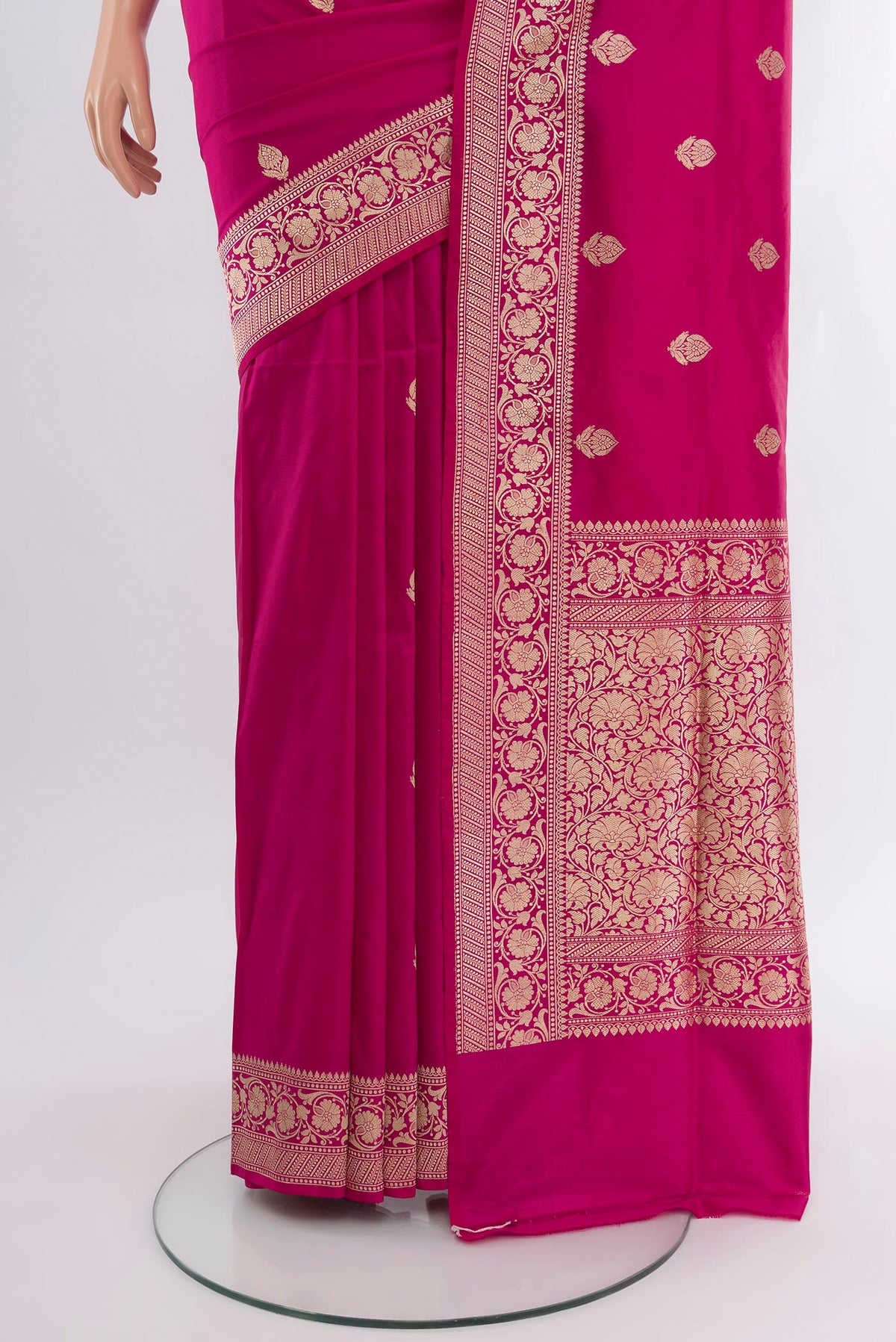 Pleats and pallu of Dark Pink Banarasi Katan Silk Saree with Zari Butta on the body and Zari Border. 