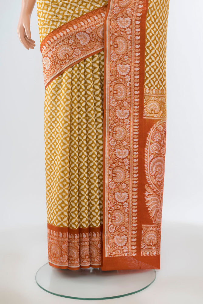 Pleats and pallu of Pure Silk Pure Zari Mehandi Green Banarasi Georgette Saree with Jacquard With Thread Butta on the body and Silk Border. 