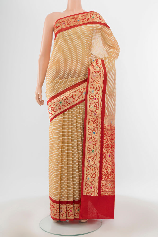 Beige Banarasi Kora Silk Saree with Zari Butta on the body and Silk Border.  displayed on a mannequin