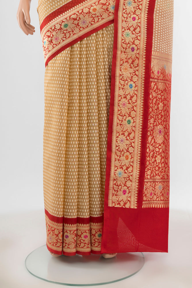 Pleats and pallu of Beige Banarasi Kora Silk Saree with Zari Butta on the body and Silk Border. 