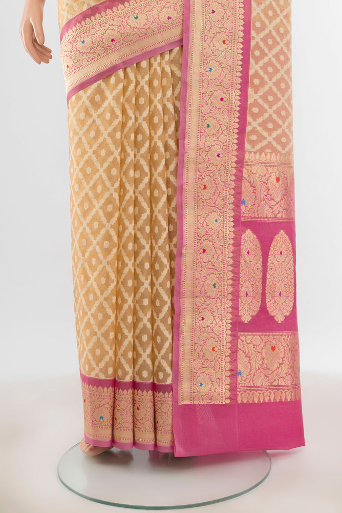Pleats and pallu of Beige Banarasi Kora Silk Saree with Zari Butta on the body and Silk Border. 